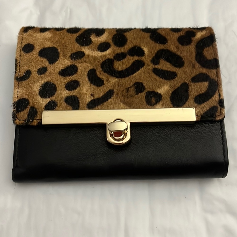 Beautiful, black, leather Danier wallet with leopard print